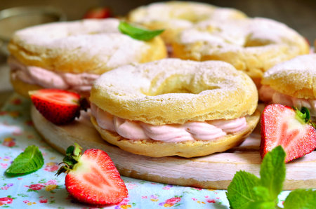 Choux pastry ring with filling from strawberry and mascarpone.