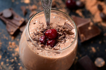Delicious chocolate smoothie "Black forest" with cherry on dark table.の写真素材