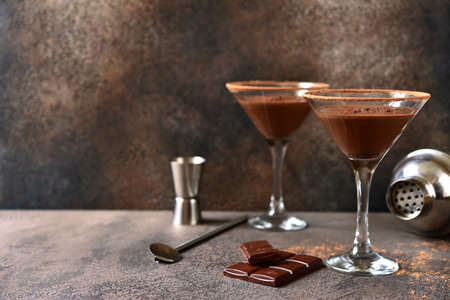 Delicious chocolate martini in a glasses on a dark slate, stone or concrete background.の写真素材