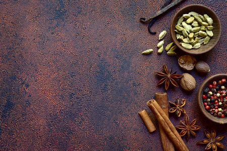 Variety of winter spices on a dark slate, stone or concrete background. Top view with copy space.の写真素材