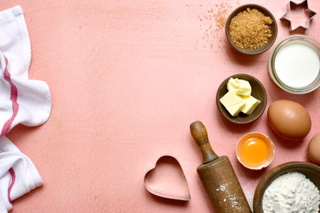 Food background with ingredients for baking on a rose slate, stone or concrete table. Top view with copy space.の写真素材