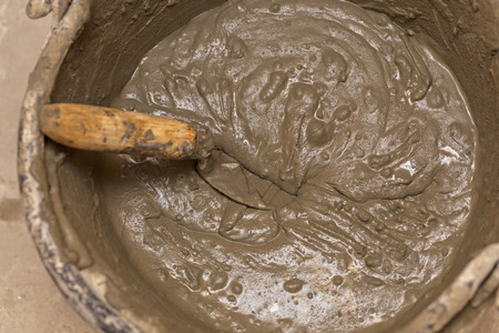 Fresh concrete mix with spatula toolの写真素材