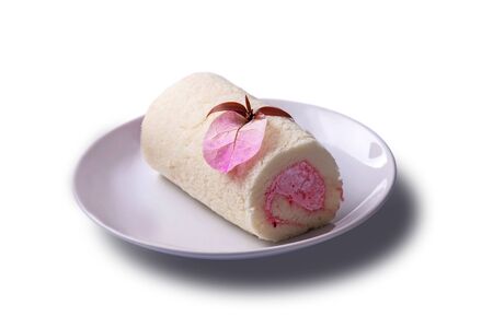 Strawberry Roll cake on dish - isolated white backgroundの写真素材