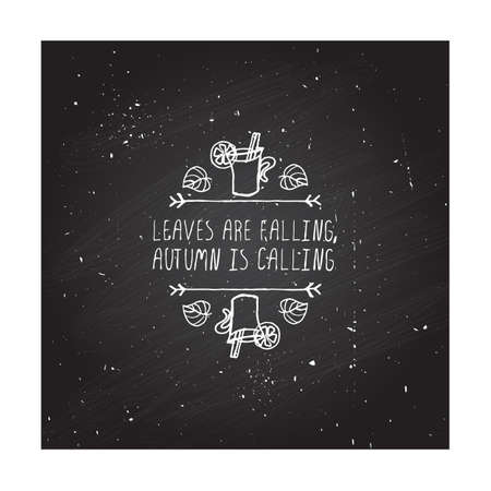 Hand-sketched typographic element with mulled wine, leaves and text on blackboard background. Leaves are falling autumn is callingのイラスト素材