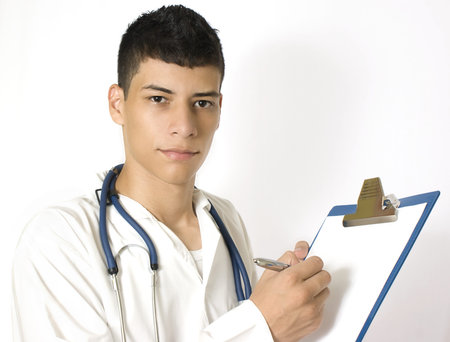 young doctor holding a tabletの写真素材
