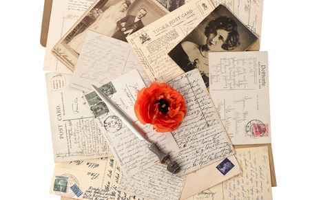 vintage background with old photos, post cards and antique letter openerの写真素材