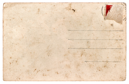 old used postcard  antique paper sheet isolated on white backgroundの写真素材