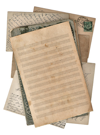 grungy paper sheet for musical notes and postcards isolated on white backgroundの写真素材