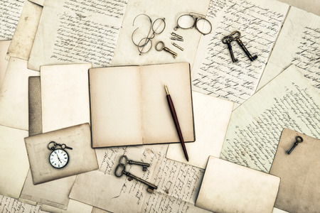 antique office tolls and keys, old diary book and letters  nostalgic sentimental backgroundの写真素材