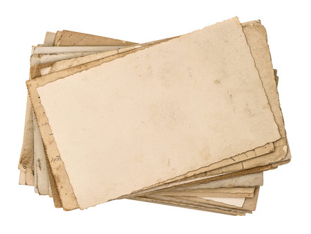 old postcards isolated on white aged paper texture