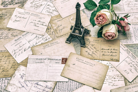 roses, antique french postcards carte postale and souvenir Eiffel Tower from Paris. nostalgic...