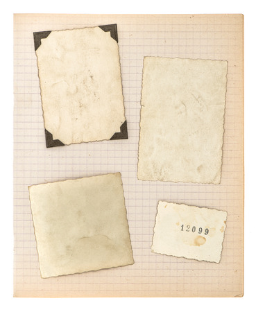 old photo frames and math book page isolated on white background. aged paperの写真素材