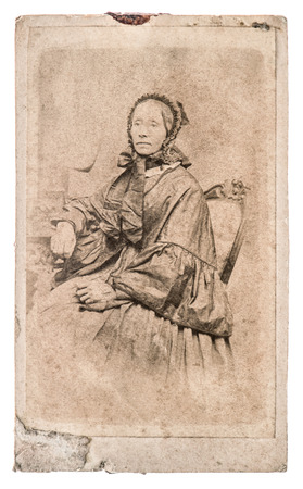 antique portrait of senior woman in victorian style dress. original vintage photo from ca. 1860の写真素材