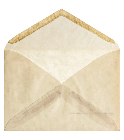 vintage grungy paper envelope isolated on white backgroundの写真素材
