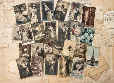 Vintage holidays greetings postcards and handwritten letter typical for early 20-th century. Retro style toned pictureの写真素材