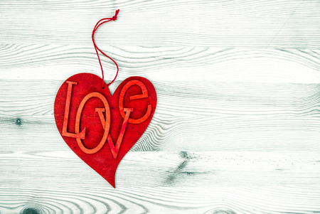 Red Heart Over Wooden Background. Love and Valentines Day Conceptの写真素材