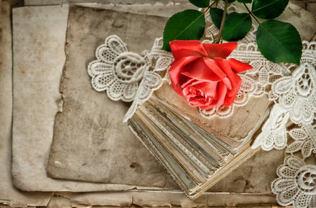 Old love letters, red rose flower and vintage laceの写真素材