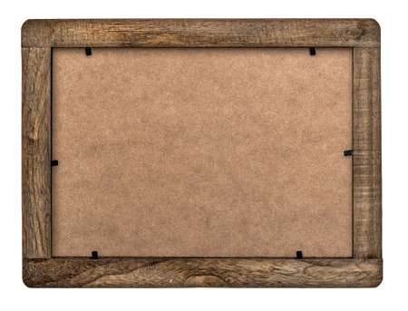 Vintage wooden picture frame with grungy cardboard isolated on white background