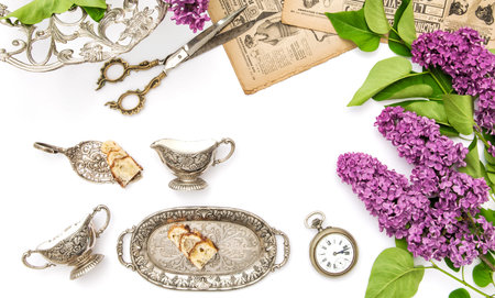 Lilac flowers, antique silver dishes. Vintage objects. Flat layの写真素材