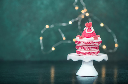 Marshmallow cake with hearts decoration on dark blue backgroundの写真素材
