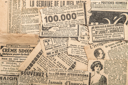 Newspaper pieces with vintage advertising. Old magazine stripsの写真素材