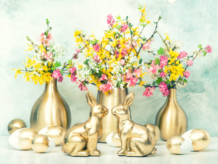 Easter bunny with golden eggs and flowers decoration. Vintage style toned picture