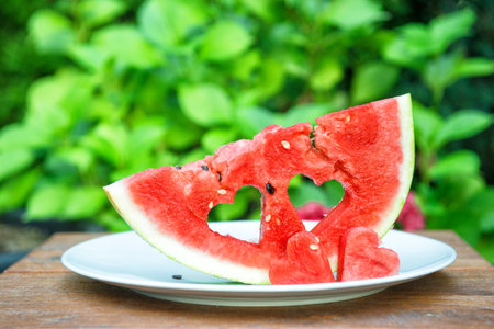 Watermelon hearts on nature outdoors background