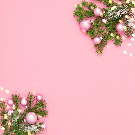 Christmas ornaments bokeh lights decoration on pink backgroundの写真素材