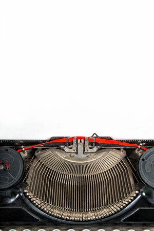 Antique typewriter with white paper sheet. Copy space for your textの写真素材