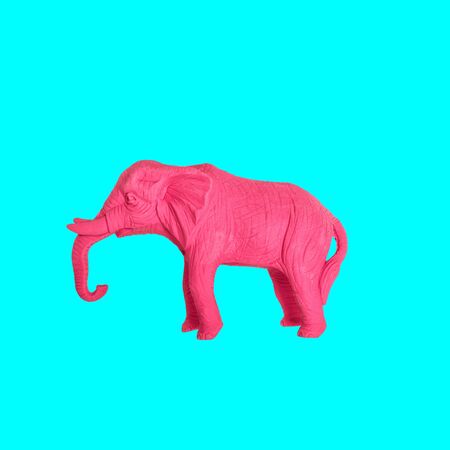 Pink elephant on neon blue background. Creative modern artの写真素材