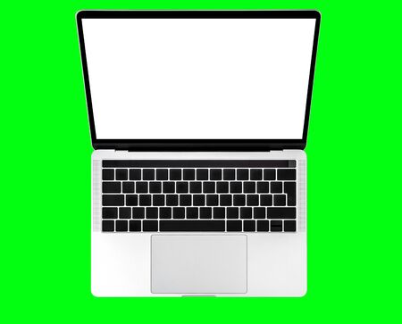 Laptop computer keyboard with white screen isolated on green backgroundの写真素材