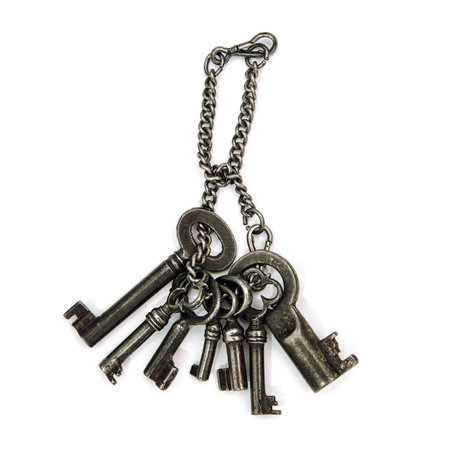 Antique rustic keys isolated on white background. Vintage accessories