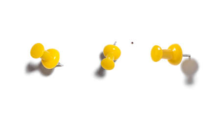 Push pin close up on white background. Yellow pushpinの写真素材