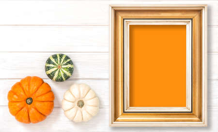 Golden frame with space for text. Pumpkin decoration. Autumn. Thanksgivingの写真素材