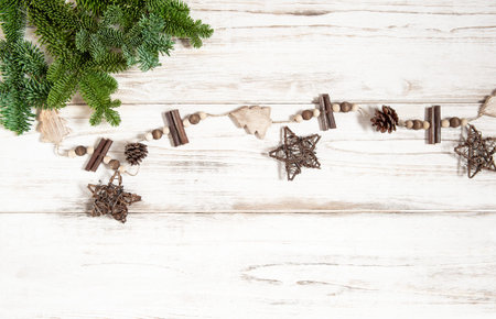 Wooden Christmas decorations with pine tree branches