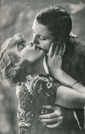 Young romantic erotic sexy couple. Vintage picture with original film grainのeditorial素材