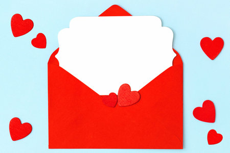 Greeting card with red hearts decoration. Valentines Day flat lay