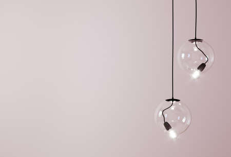 Decorative ceiling lights / hanging lights on pink background with copy space. 3d renderingの写真素材