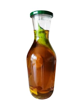glass bottle with tincture, unusual shape, on a white backgroundの写真素材