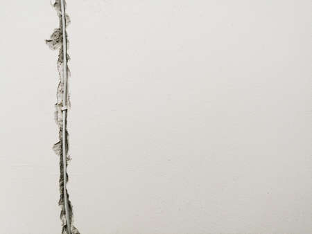 Socket and electrical wires on the wall, home renovation conceptの写真素材