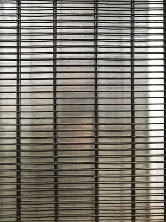 metal grill background. refrigeration equipment. theme backgrounds and textures.の写真素材