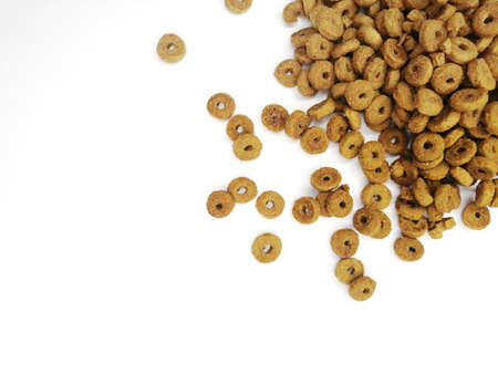 dry pet food scattered - top view, space for text. flat lei wet cat food on a white background.の写真素材
