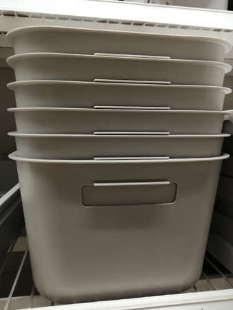 white plastic boxes for storing things. home goods storeの写真素材
