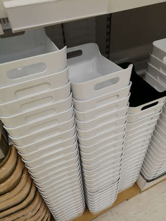 white plastic boxes for storing things. home goods storeの写真素材