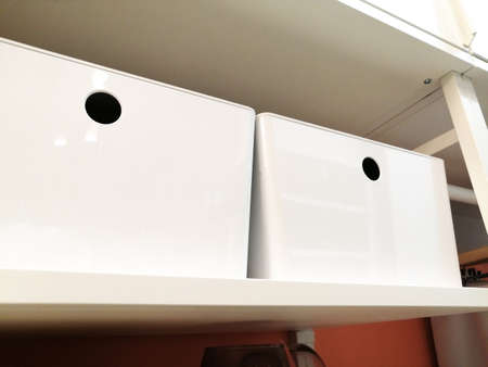 white plastic boxes for storing things. home goods storeの写真素材