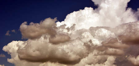 Dark night sky with storm clouds. Horizontal natural background.の写真素材