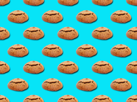 Seamless pattern with cookies. Oatmeal cookies on a blue background.
