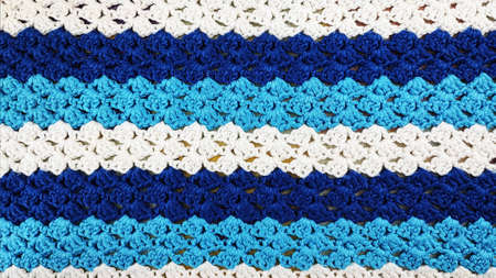 Knitted colored texture. Crochet background.の写真素材