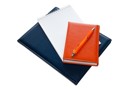 Notebooks spiral and pen isolated on a white backgroundの写真素材