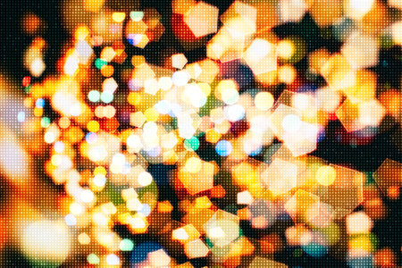 Bokeh light, shimmering blur spot lights on beige abstract background.